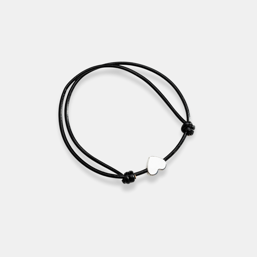 Pulsera de piel ajustable con dije