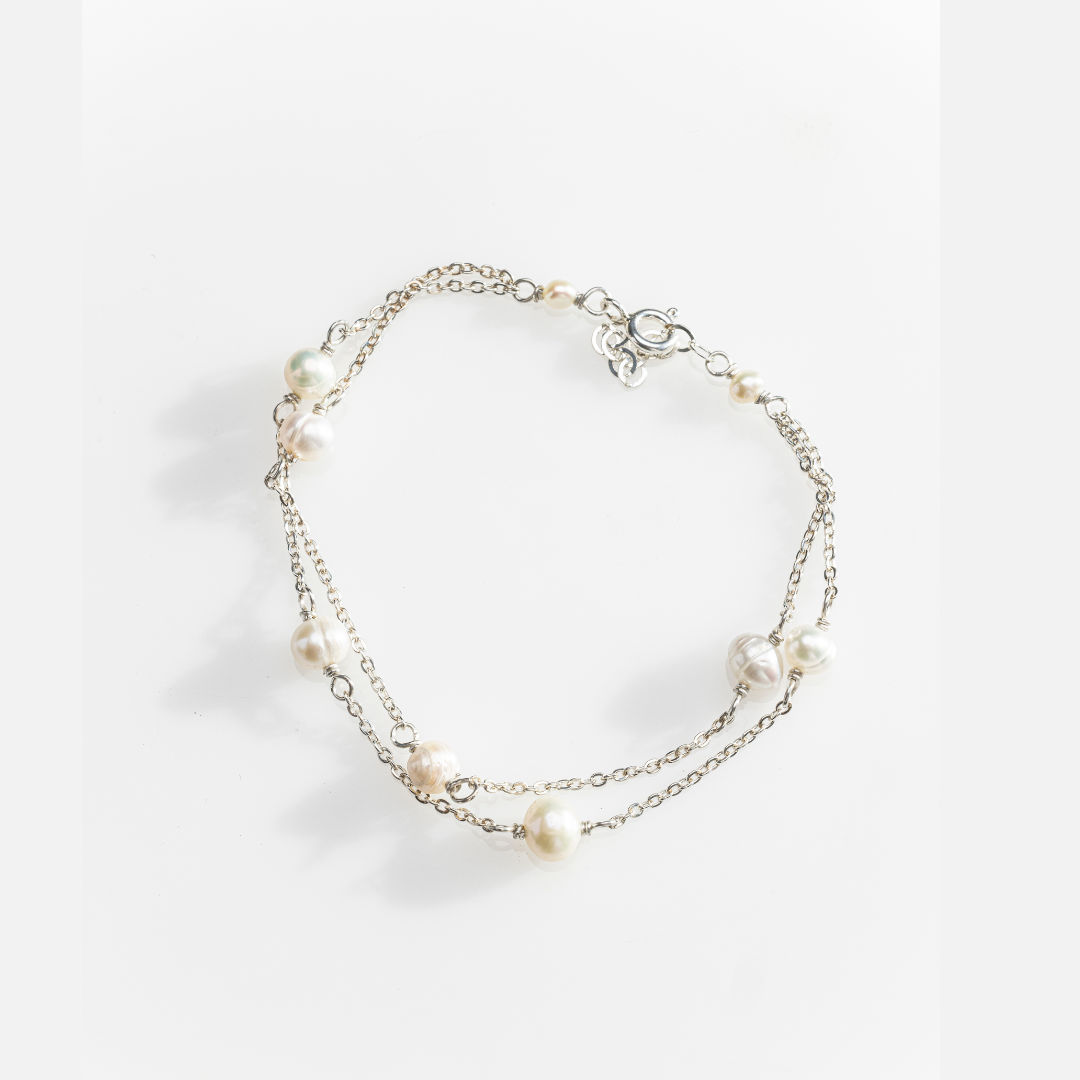 Pulsera perlas separadas