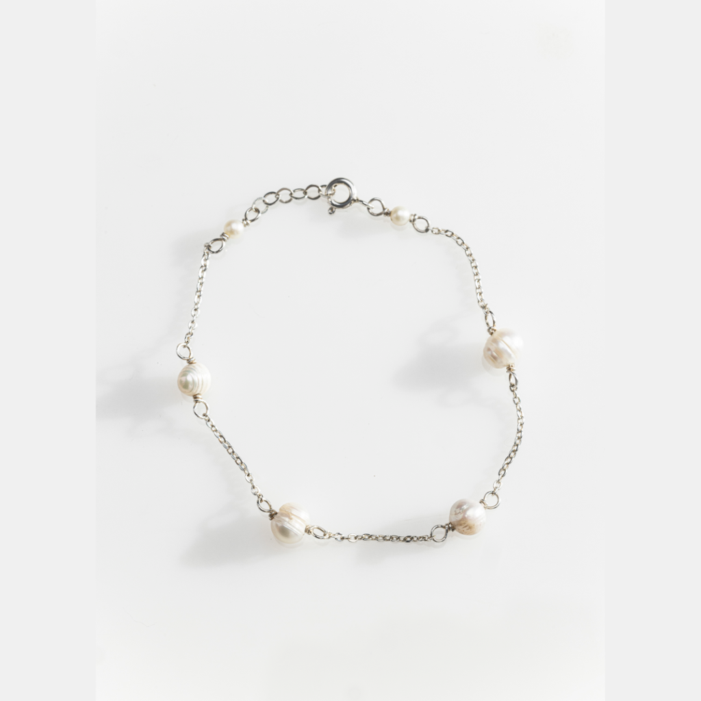 Pulsera perlas separadas