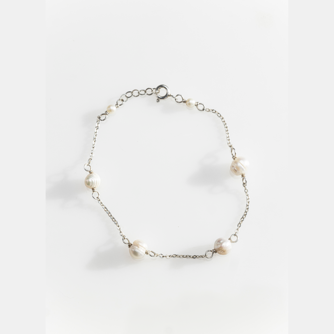 Pulsera perlas separadas