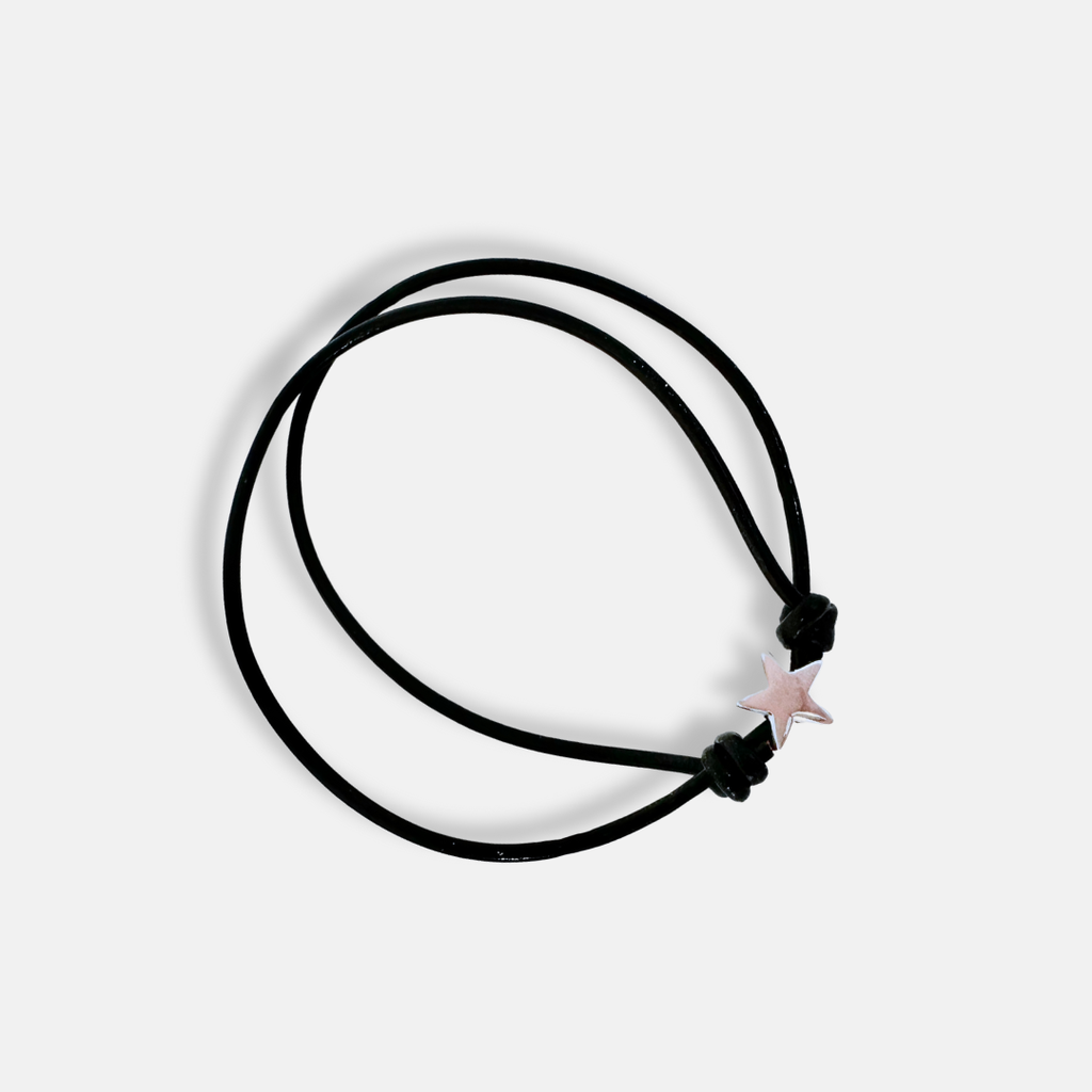 Pulsera de piel ajustable con dije